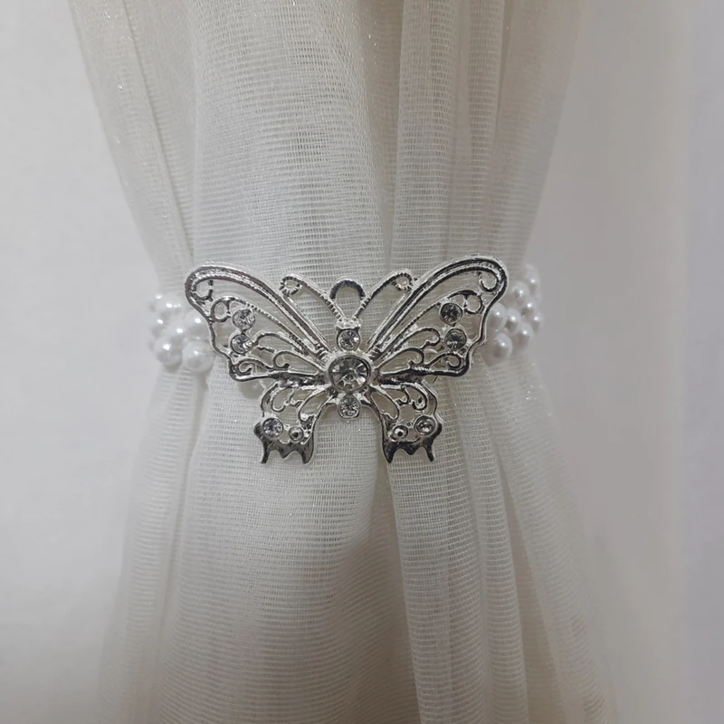 عکس شماره 3 : پرده جمع کن مدل پروانه