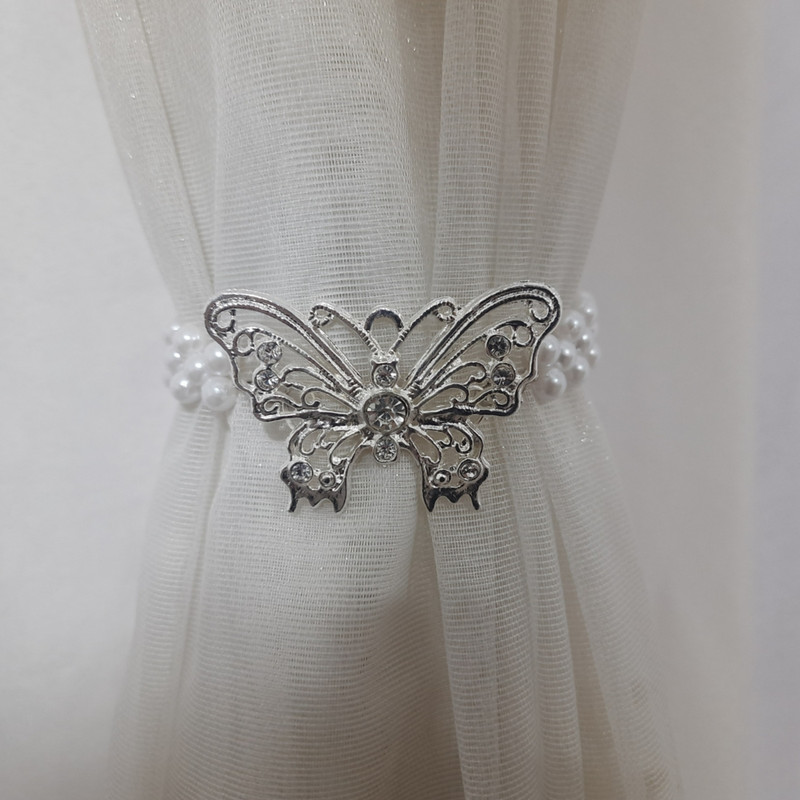 پرده جمع کن مدل پروانه