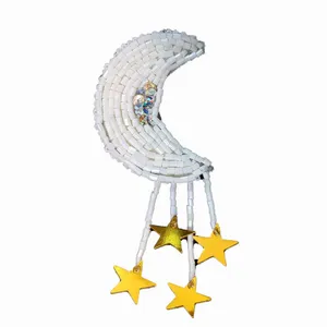 گل سینه زنانه مدل ماه و ستاره