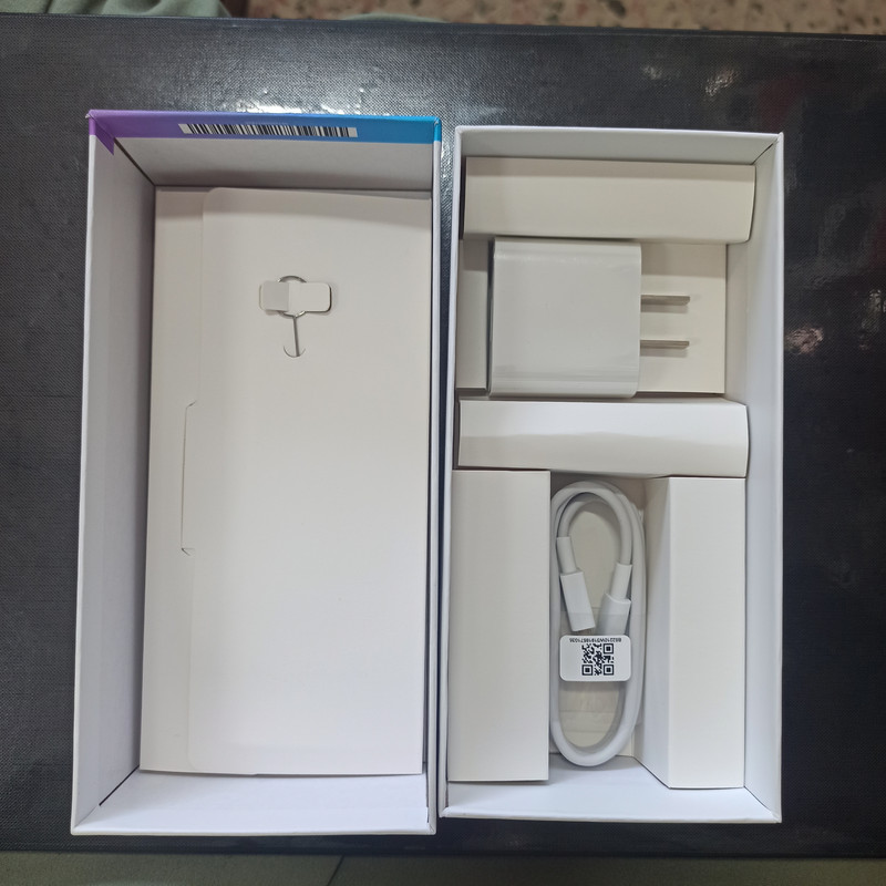 قیمت و خرید شارژر دیواری شیائومی مدل redmi 9A به همراه کابل تبدیل microusb