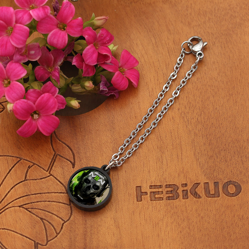 آویز ساعت زنانه ناکسیگو مدل شب تاب طرح Call of Duty کد AW7266 آویز ساعت زنانه ناکسیگو مدل شب تاب طرح Call of Duty کد AW7266