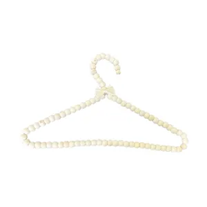 چوب لباسی نوزاد مدل چوبی مرواریدی