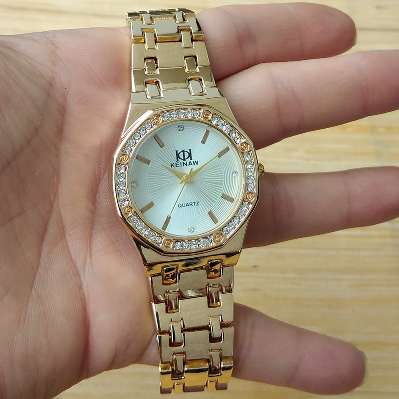 ساعت مچی عقربه ای زنانه مدل بندفلزی نگین دار کد 02 ساعت مچی عقربه ای زنانه مدل بندفلزی نگین دار کد 02