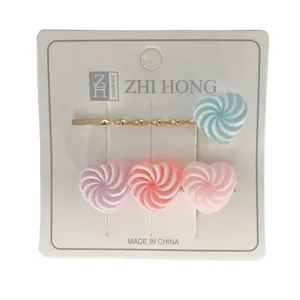 سنجاق مو دخترانه مدل 0002 طرح آبنبات بسته 2 عددی