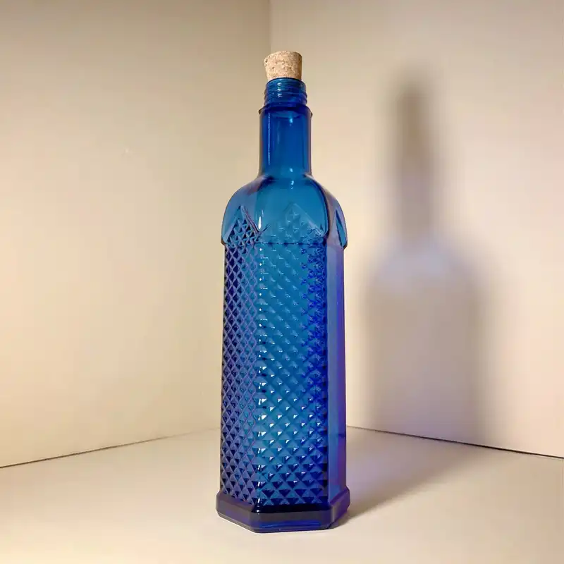 بطری شیشه ای مدل آب خورشیدی شش ضلعی