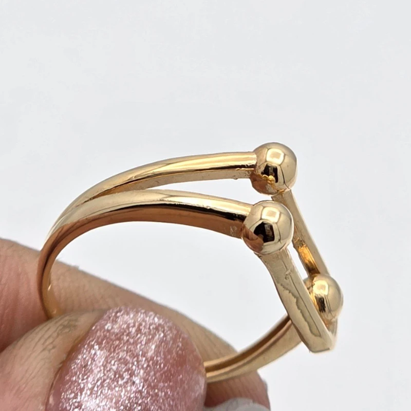 عکس شماره 4 : انگشتر طلا کم اجرت 18 عیار زنانه با طرح تیفانی طلا و شمش برلیان کد 5 سایز 57