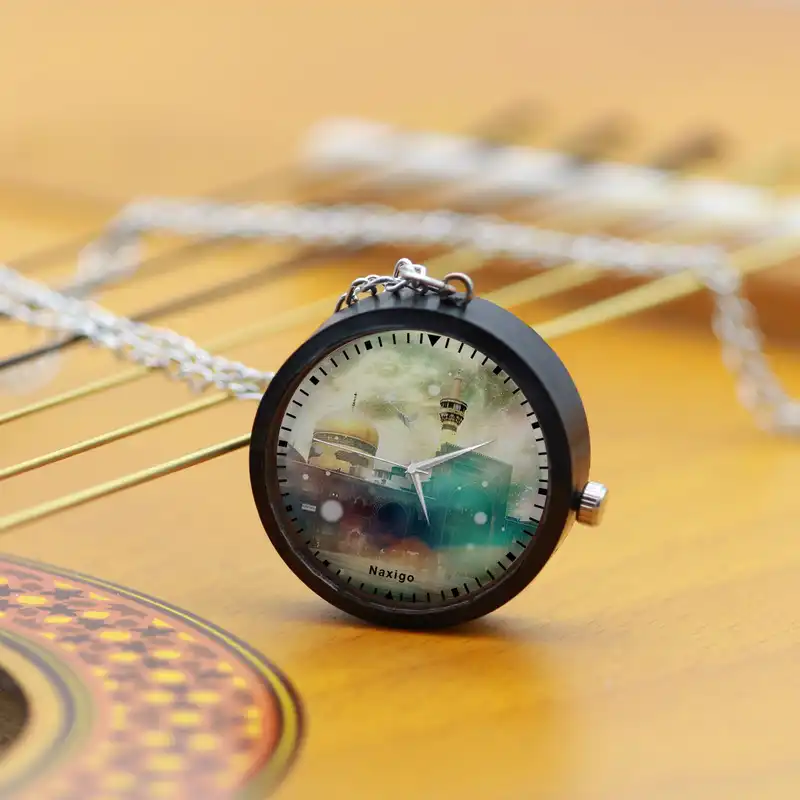 ساعت گردنبندی عقربه ای ناکسیگو مدل حرم امام رضا کد NF12653
