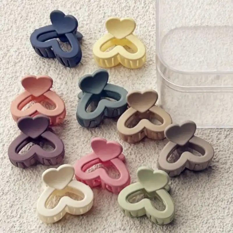 کلیپس مو زنانه مدل فانتزی قلبی کد 1767 بسته دو عددی