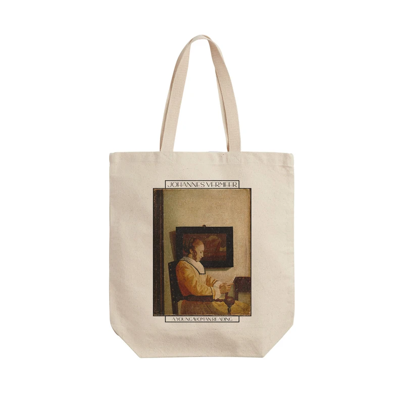 ساک خرید ترمه طراحان ایده مدل یک زن در حال خواندن از ورمر کد art0560 - L