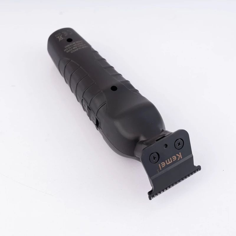 ماشین اصلاح موی صورت کیمی مدل KM-2299+5Vadapter، اصلاح به صورت خط زن، منبع انرژی باتری قابل شارژ، تکنولوژی اصلاح به صورت برش مستقیم، مدت زمان شارژ 180 دقیقه و مدت زمان استفاده پس از شارژ 180 دقیقه، به همراه آداپتور، برس تمیزکننده، روغن، 3 عدد شانه -  - 7