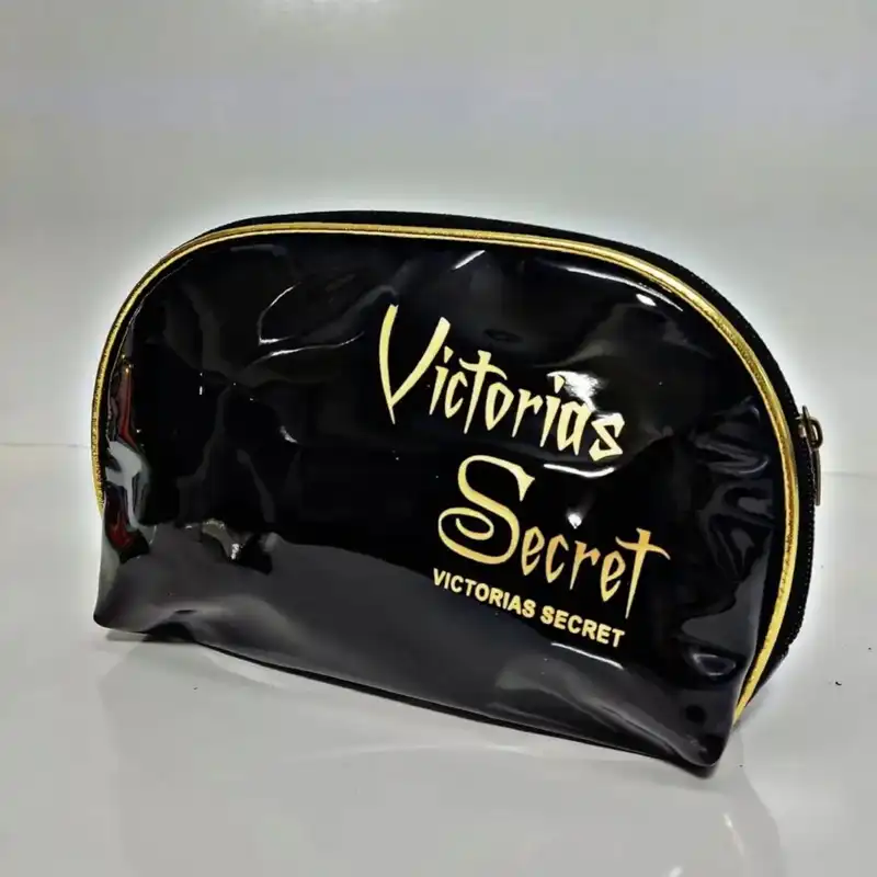 کیف لوازم آرایش زنانه مدل نیمگرد ورنی براق