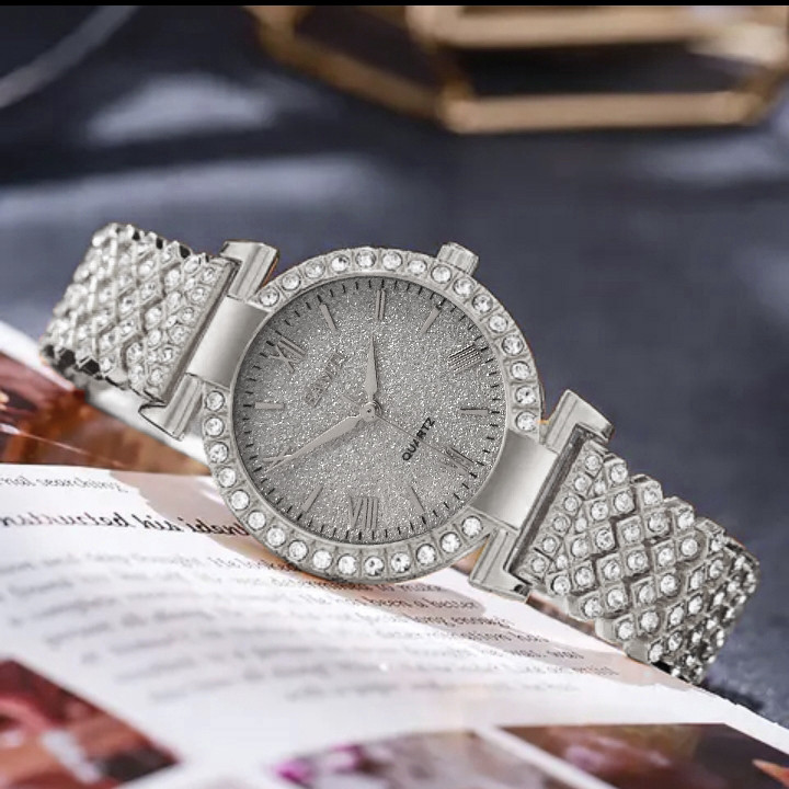 ساعت مچی عقربه ای زنانه مدل فول نگین شنی کد 123