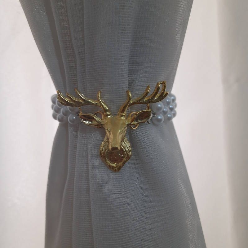 پرده جمع کن مدل گوزن