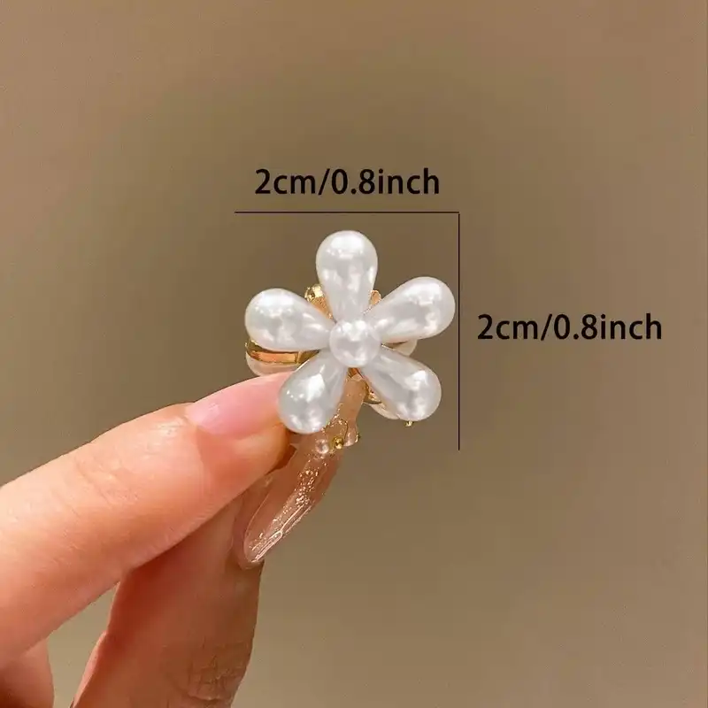 کلیپس مو مدل مینی شکوفه مرواریدی کد np80 بسته چهار عددی