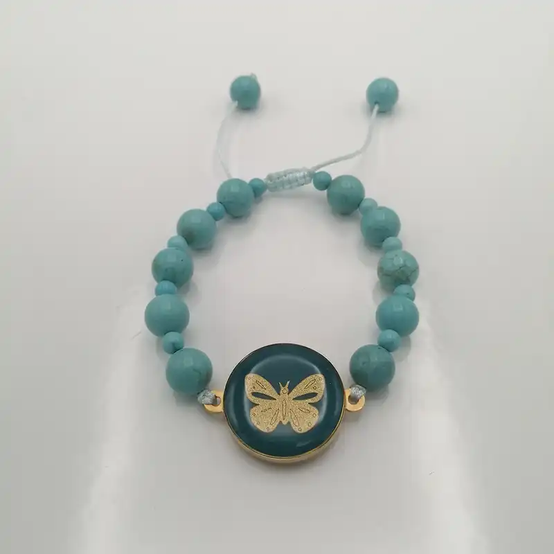 ست زنانه زرین هنر ایران مدل پروانه فیروزه ای