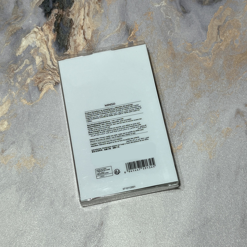 تیغ اصلاح ابرو مینیسو مدل 100-0 به همراه قیچی ابرو