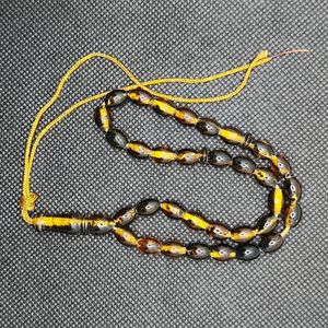 نقد و بررسی تسبیح مدل کهربا معطر لیمویی کد 60 توسط خریداران