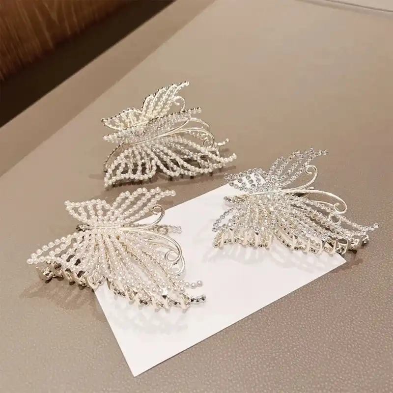 کلیپس مو زنانه مدل پروانه ای طرح نگین و مروارید