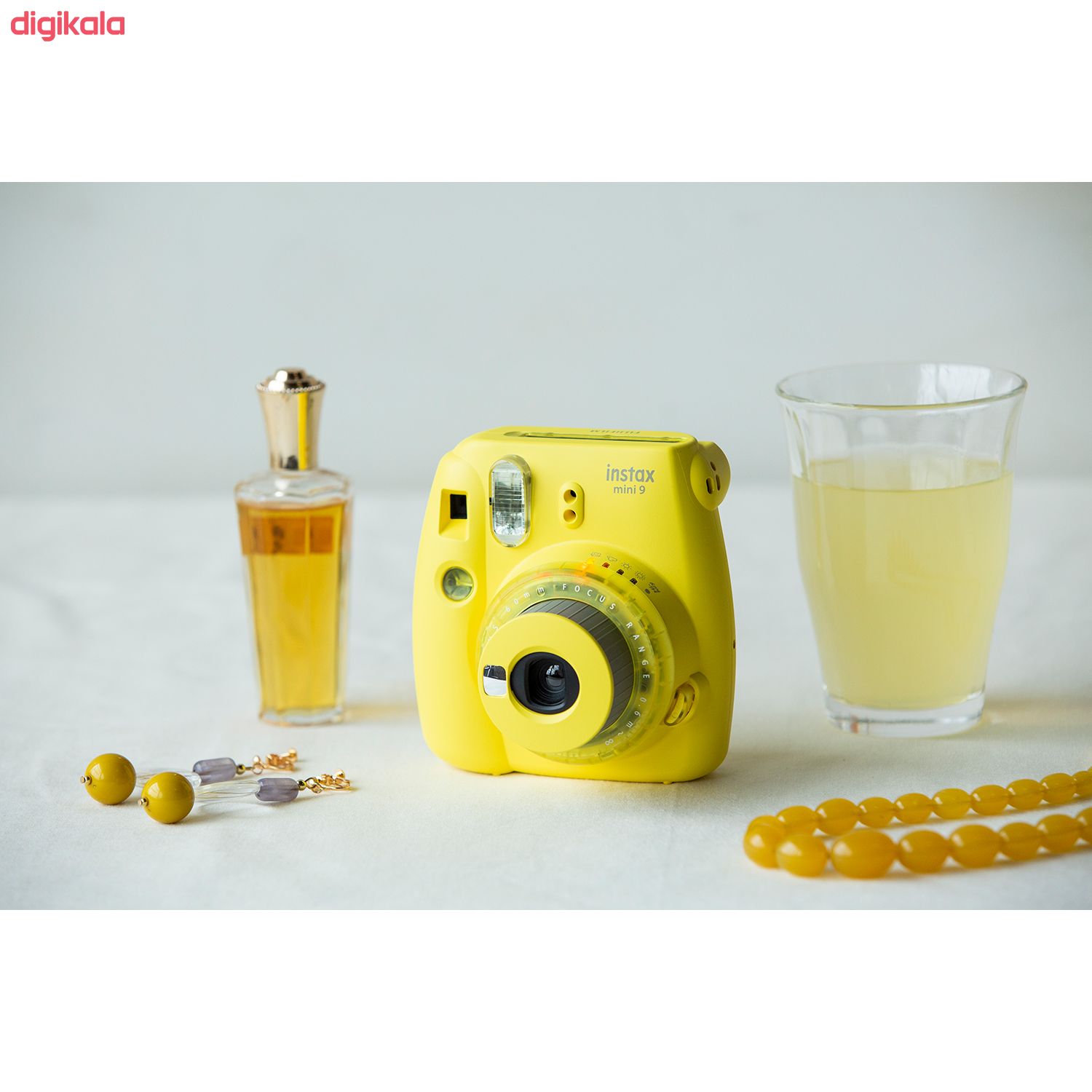 دوربین عکاسی چاپ سریع فوجی فیلم مدل Instax Mini 9 Clear به همراه یک بسته فیلم مدل Despicable Me بسته ۱۰ عددی main 1 34