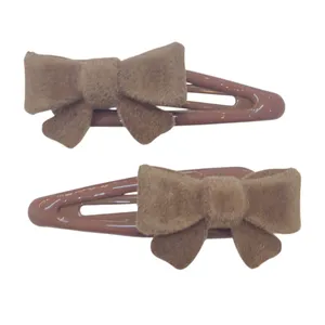 گیره مو دخترانه مدل تق تقی پاپیونی کد TAGP01 بسته 2 عددی