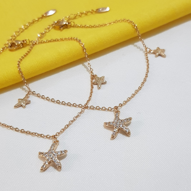 دستبند زنانه ژوپینگ مدل ستاره دریایی نگینی 3334