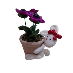 گلدان 
به همراه
گل مصنوعی مدل خرگوش کد 02