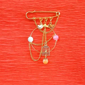 سنجاق سینه زنانه مدل چرخه رهایی کد 1556