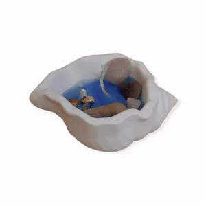 شمع دست ساز مدل صدف حلزونی