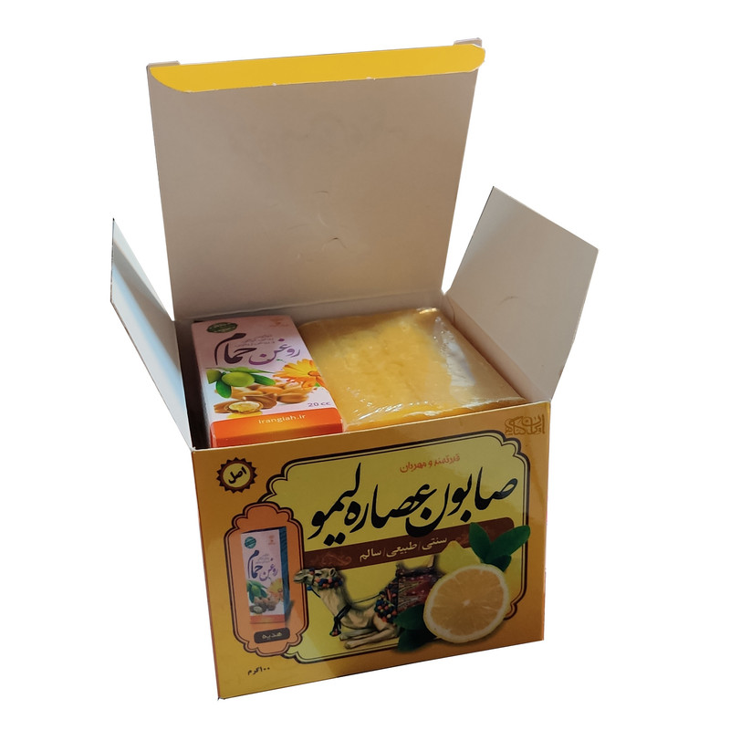 صابون شستشو ایران گیاه مدل عصاره لیمو وزن 100 گرم به همراه روغن بدن مدل 01 حجم 20 میلی لیتر