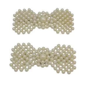 گیره مو زنانه مدل تق تقی پاپیون مرواریدی کد GI02  بسته 2 عددی