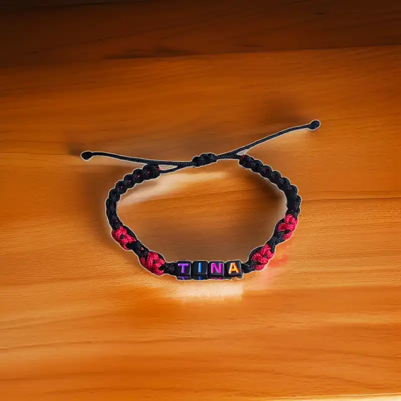 دستبند زنانه مدل بافت اسم تینا