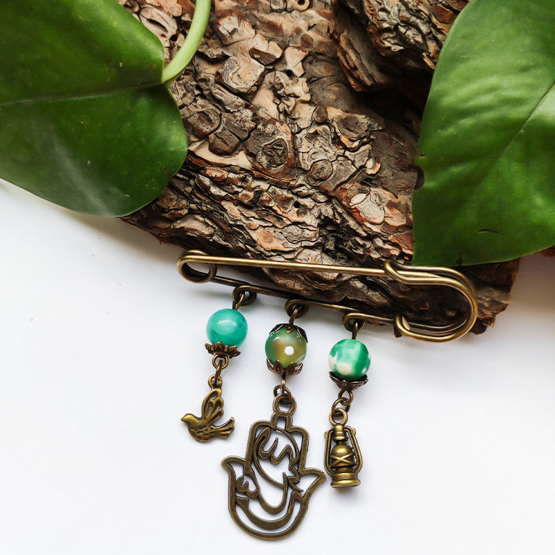 سنجاق سینه زنانه مدل پرنده و فانوس