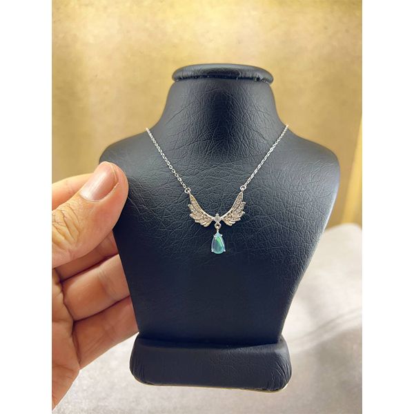 گردنبند نقره زنانه سواروسکی مدل بال فرشته و سنگ اوپال کد 2154101 -  - 2