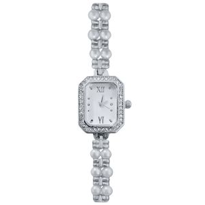 ساعت مچی عقربه‌ای کوارتز زنانه مدل لوکس بند دستبندی مرواریدی قاب دور نگین کد ۱.۷