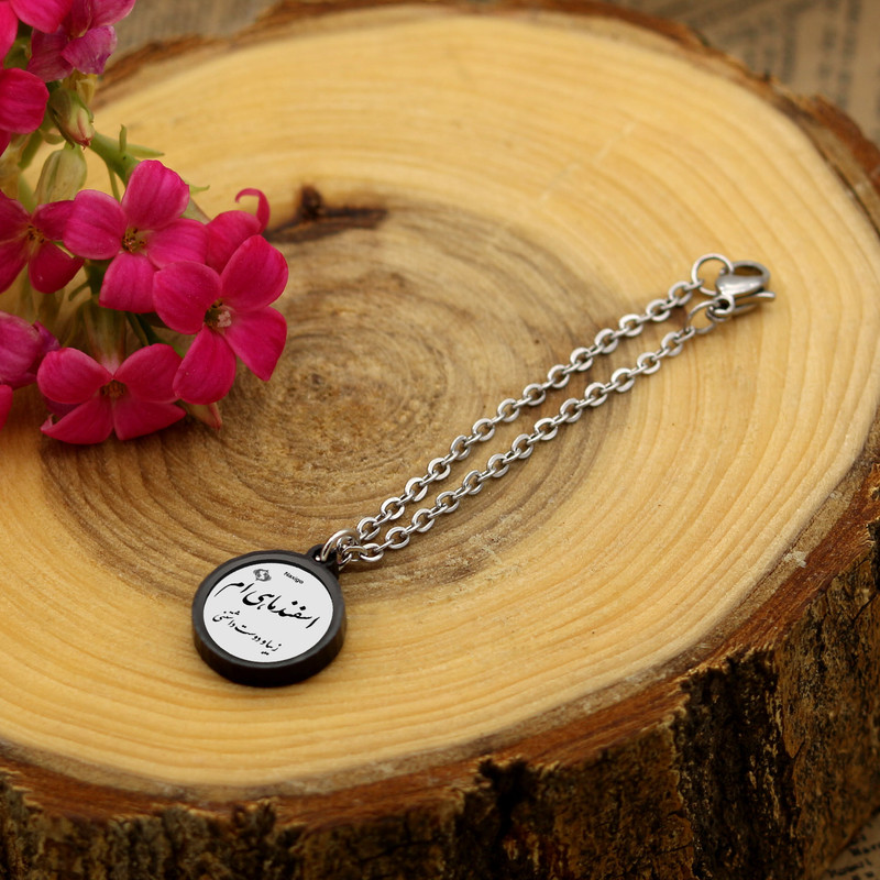 آویز ساعت زنانه ناکسیگو مدل شب تاب طرح اسفند ماهی ام کد AW8820