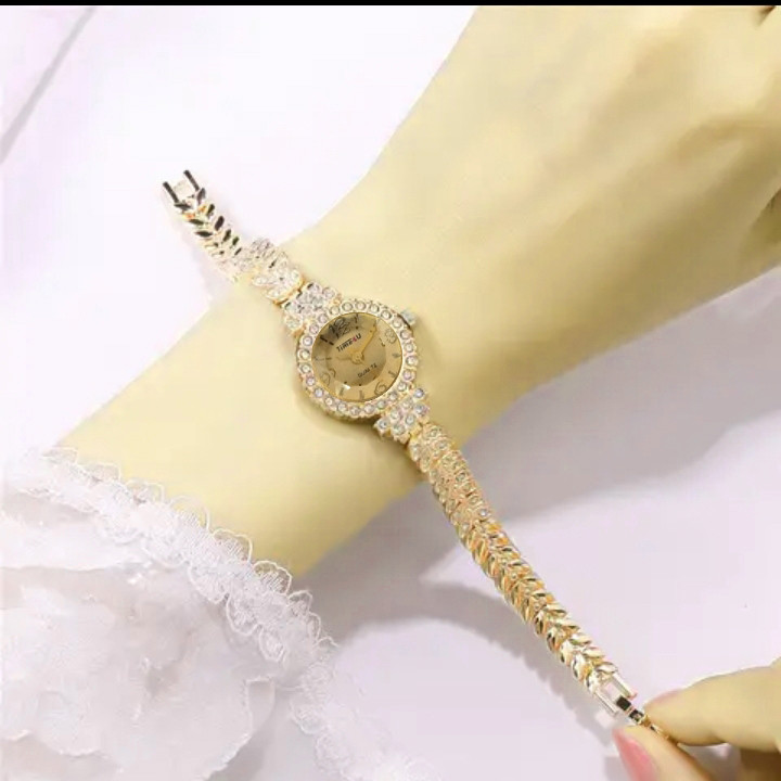 ساعت مچی عقربه ای زنانه مدل گندم نگینی کد 23 ساعت مچی عقربه ای زنانه مدل گندم نگینی کد 23