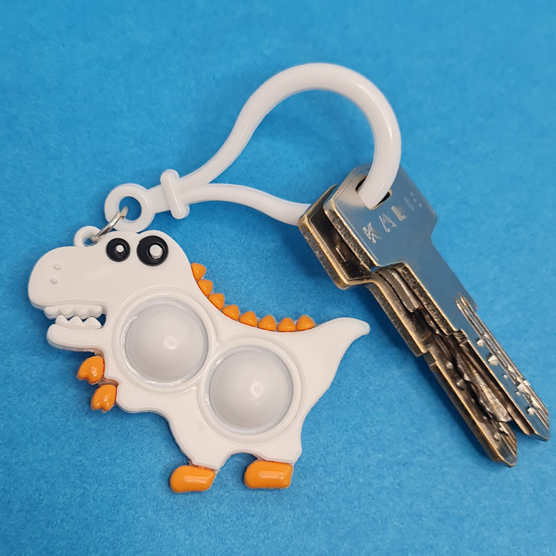 جاکلیدی دخترانه مدل سیلیکونی پاپیت طرح دایناسور تیرکس جاکلیدی دخترانه مدل سیلیکونی پاپیت طرح دایناسور تیرکس