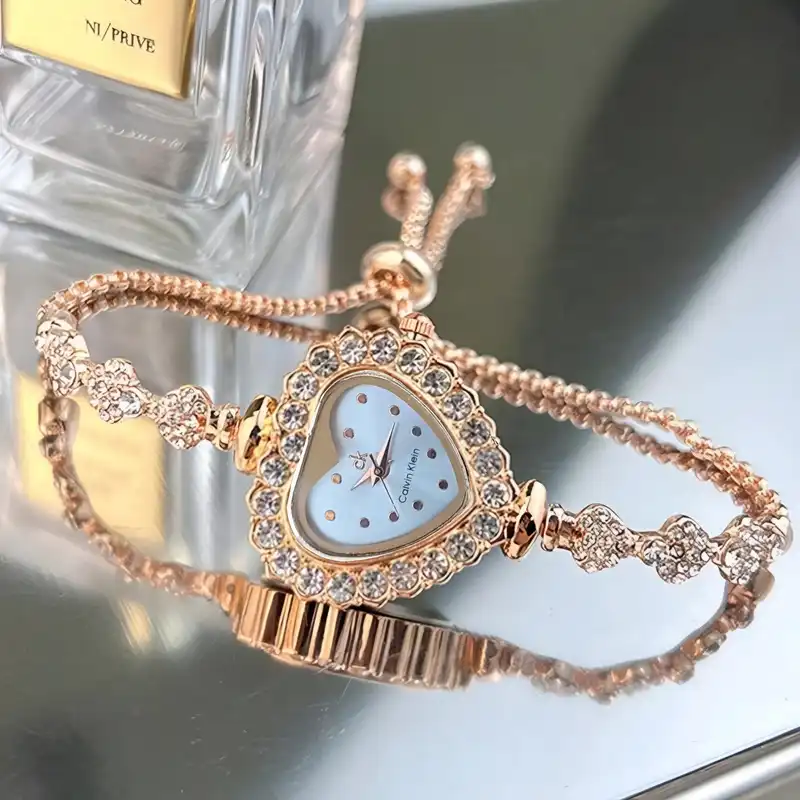 ساعت مچی عقربه ای زنانه مدل قفل کرواتی دور نگین طرح قلب کد 1