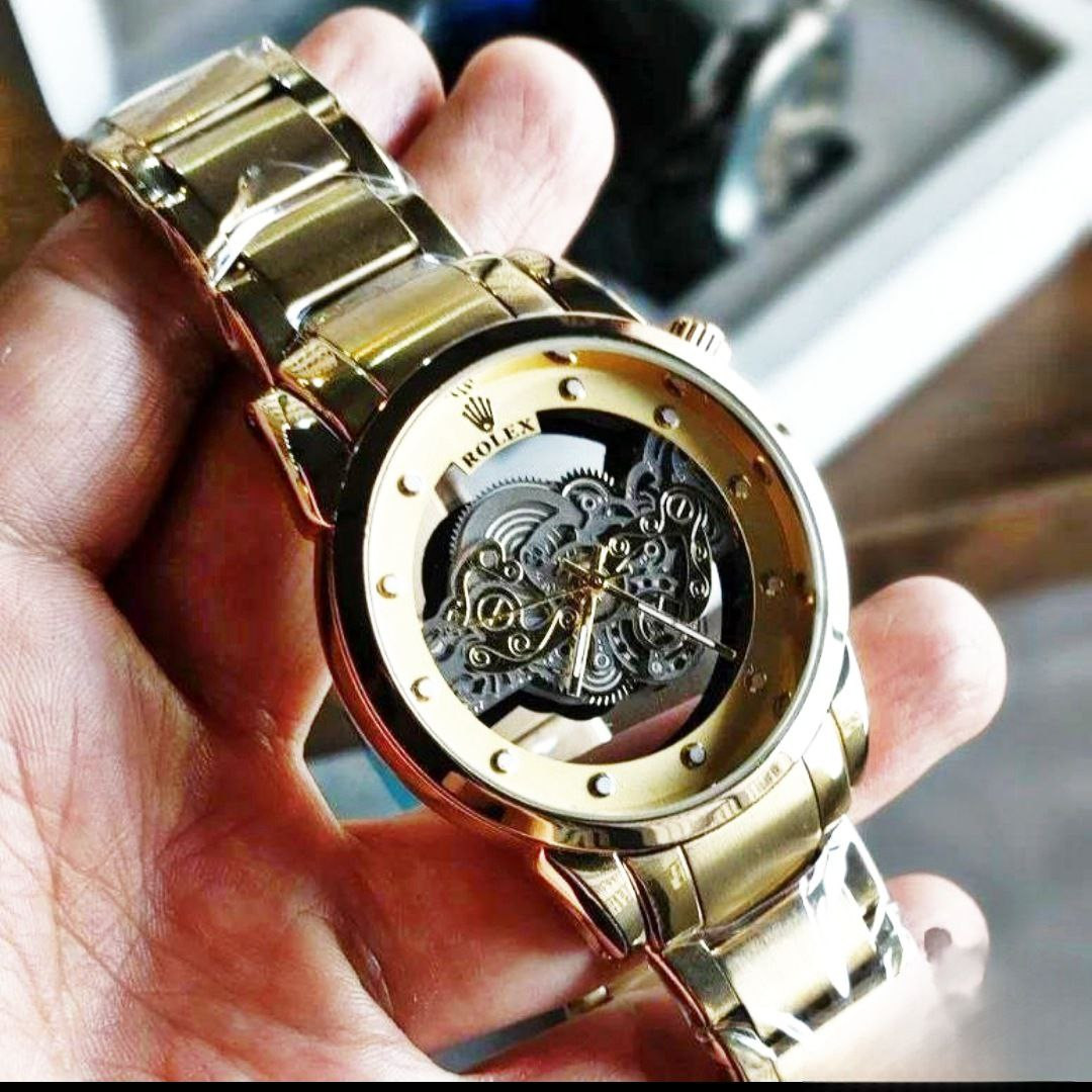 ساعت مچی عقربه‌ای مردانه  مدل پشت شیشه ای موتور پیدا