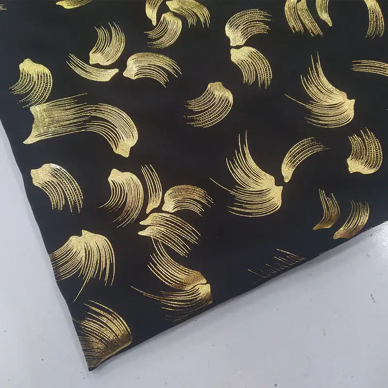 پارچه لباس مدل ابر و بادی طلاکوب