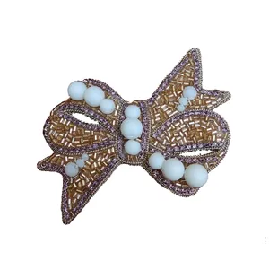 گل سینه زنانه مدل پاپیون