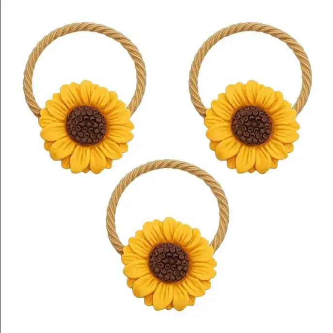 کش مو زنانه مدل آفتابگردان بسته 30 عددی