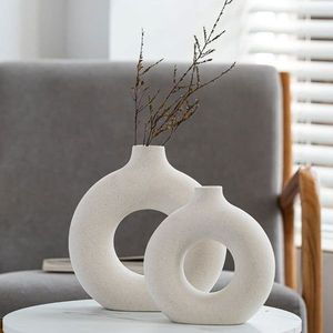 گلدان دکوری مدل dunat بسته 2 عددی با بدنه قابل شستوشو، رنگ ثابت و طراحی پتینهدار مناسب دکوراسیون مینیمال و هدیه