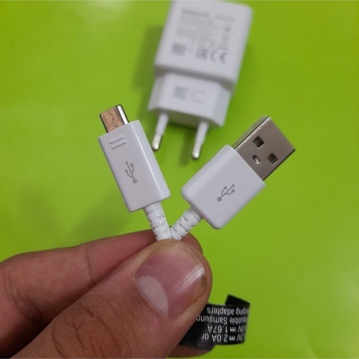 شارژر دیواری مدل ORGINAL 2AMP به همراه کابل تبدیل microUSB شارژر دیواری مدل ORGINAL 2AMP به همراه کابل تبدیل microUSB