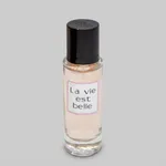 عطر جیبی زنانه نیو پرستیژ کالر مدل La Vie Est Belle حجم 35 میلی لیتر