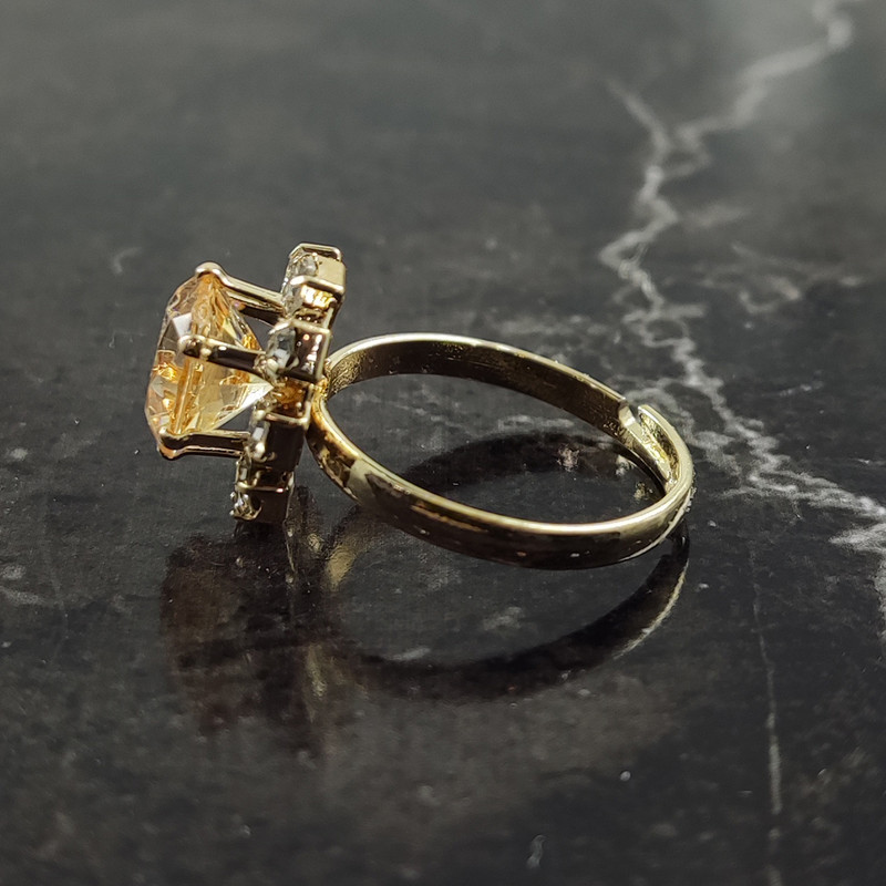 انگشتر دخترانه سلین کالا مدل سیترین طرح گل کد 13 انگشتر دخترانه سلین کالا مدل سیترین طرح گل کد 13