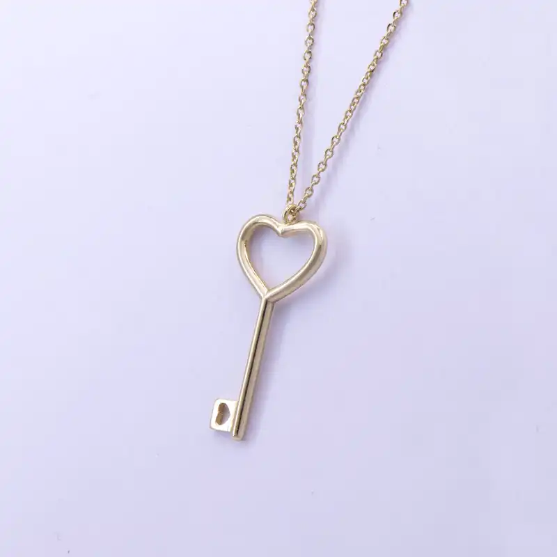 گردنبند طلا 18 عیار زنانه پولک مدل کلید