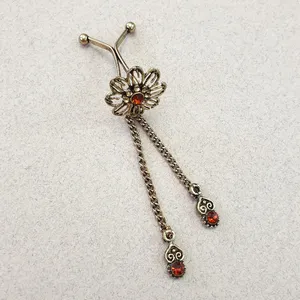 سنجاق روسری زنانه مدل گل كد SF79