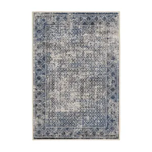 فرش ماشینی 1000 شانه اورکوم زمینه کرم حاشیه سرمه ای طرح مینیمال تیارا کد OR.1120.01