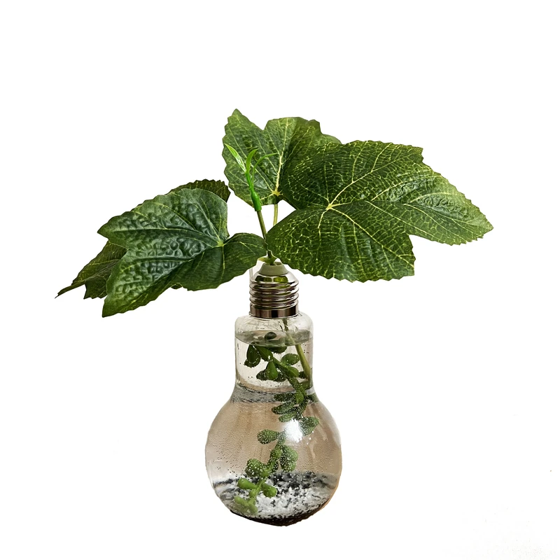 گلدان به همراه گل مصنوعی مدل برگ انگور لامپی 